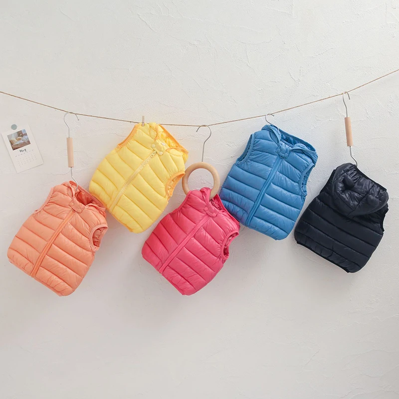 

Пуховик детский однотонный на молнии, без рукавов, на возраст 1-7 лет