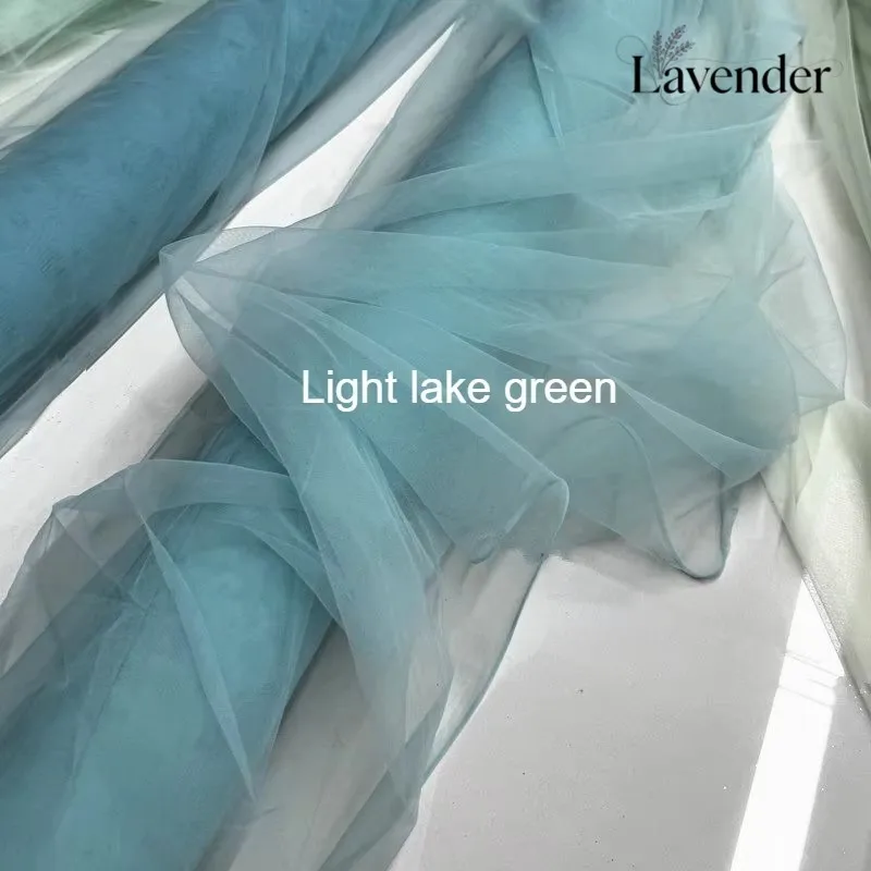 Фото Зеленая прозрачная швейцарская сетчатая ткань из тюля Lake Green: тонкая, мягкая, плотная, прозрачная сетка, идеально подходит для декора на свадьбу, фестиваль, вечеринку, фон для фотосессий. №1