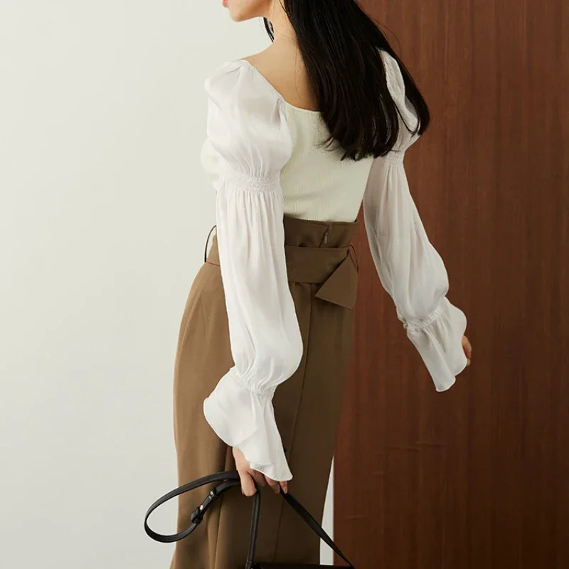 Женский свитер с пышными рукавами-фонариками и воротником-стойкой