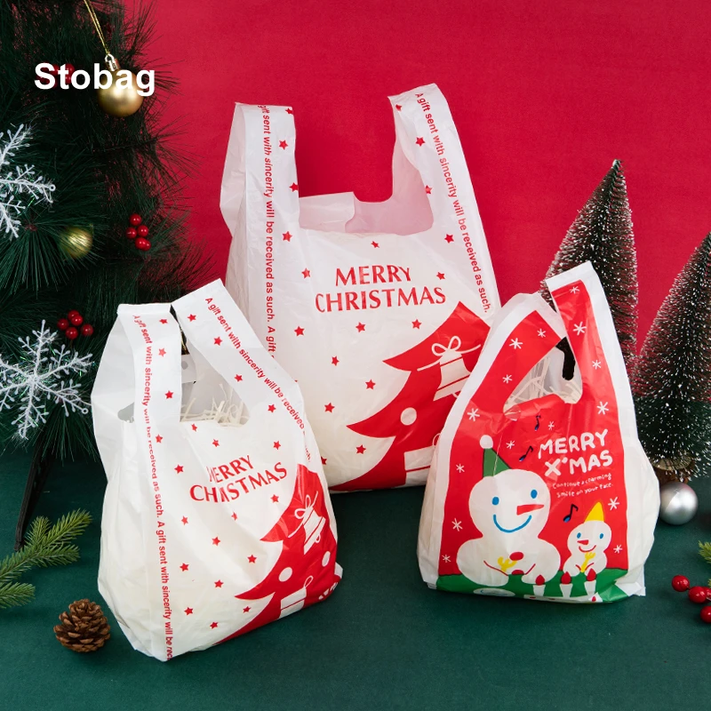 

StoBag 100pcs Marry Christmas Plastic Tote Bags Gift Package Hnadle Santa Claus Handmade Kids Party Favors New Year Supplies