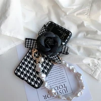 luxury camellia flower phone cover for samsung galaxy z flip 4 3 2 1 5g irregularity pearl bracelet houndstooth pu leather case