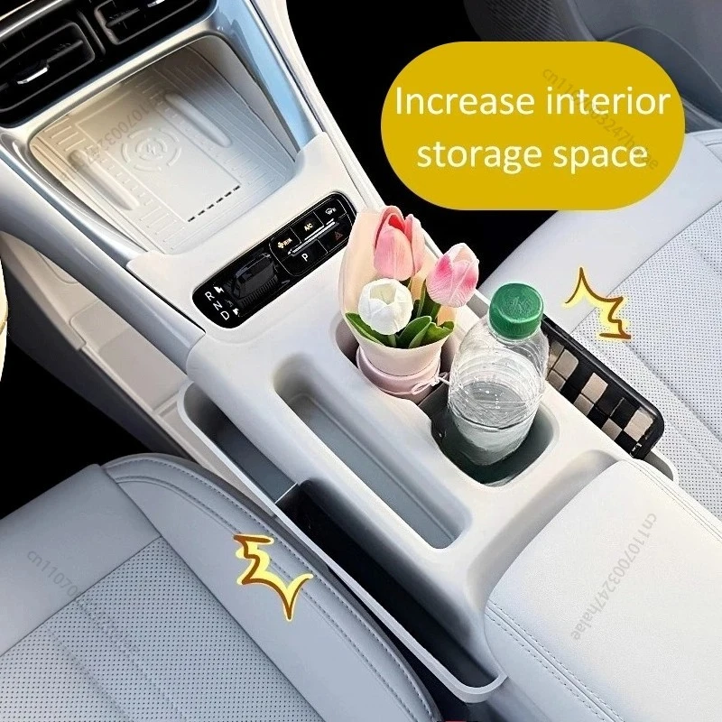 Фото Для Geely EX2 Proton eMas 5 Geome XINGYUAN 2025-2026: Органайзер для центральной консоли с беспроводной зарядкой, силиконовой подставкой и отсеком для хранения №3