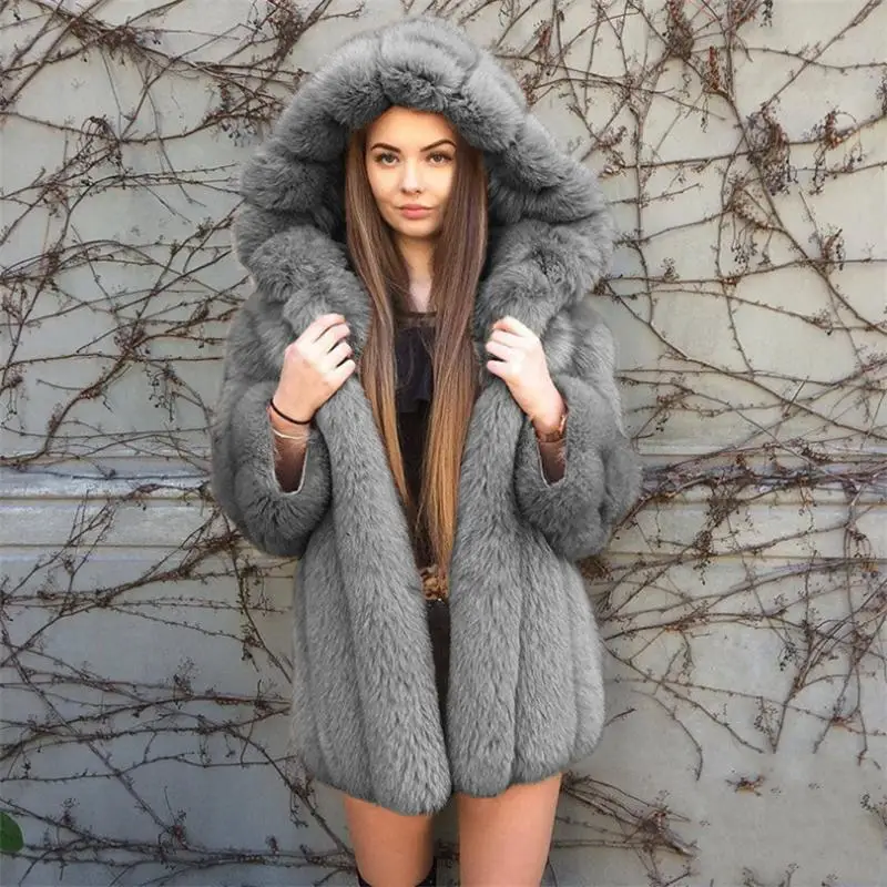 Winter New Hot Street Sales European And American Women's Hooded Stitching In The Long Coat Spot Fox Fur Imitation