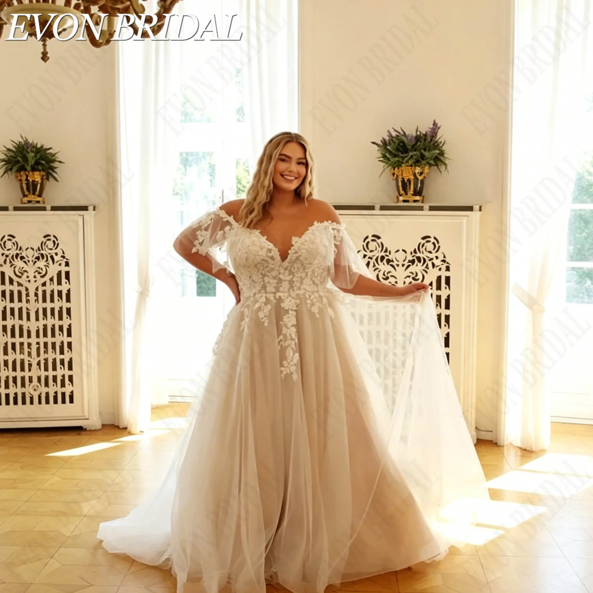 Фото EVON BRIDAL Свадебное платье больших размеров с кружевными аппликациями V-образный вырез из тюля А-силуэт на одно плечо индивидуальный пошив невесты платье для свадебной церемонии официального бракосочетания №4