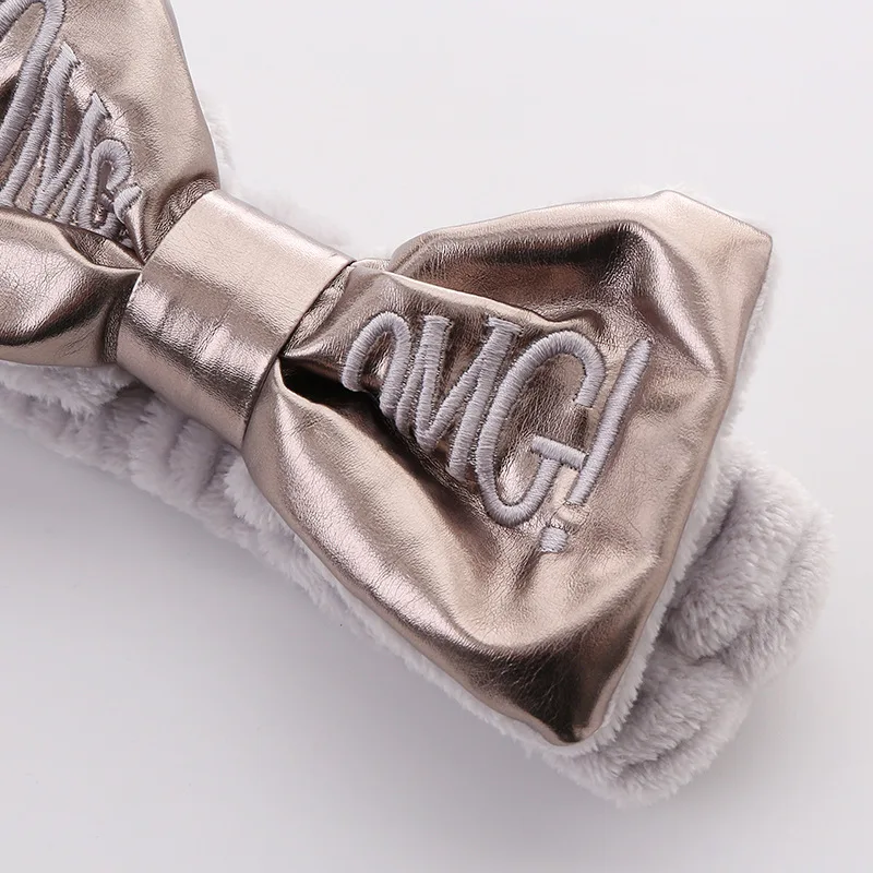 Повязка на голову Женская флисовая эластичная с бантом и надписью OMG |