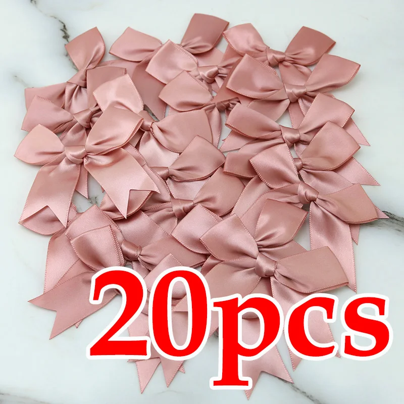 

Розовые атласные банты Homearound 20 шт.