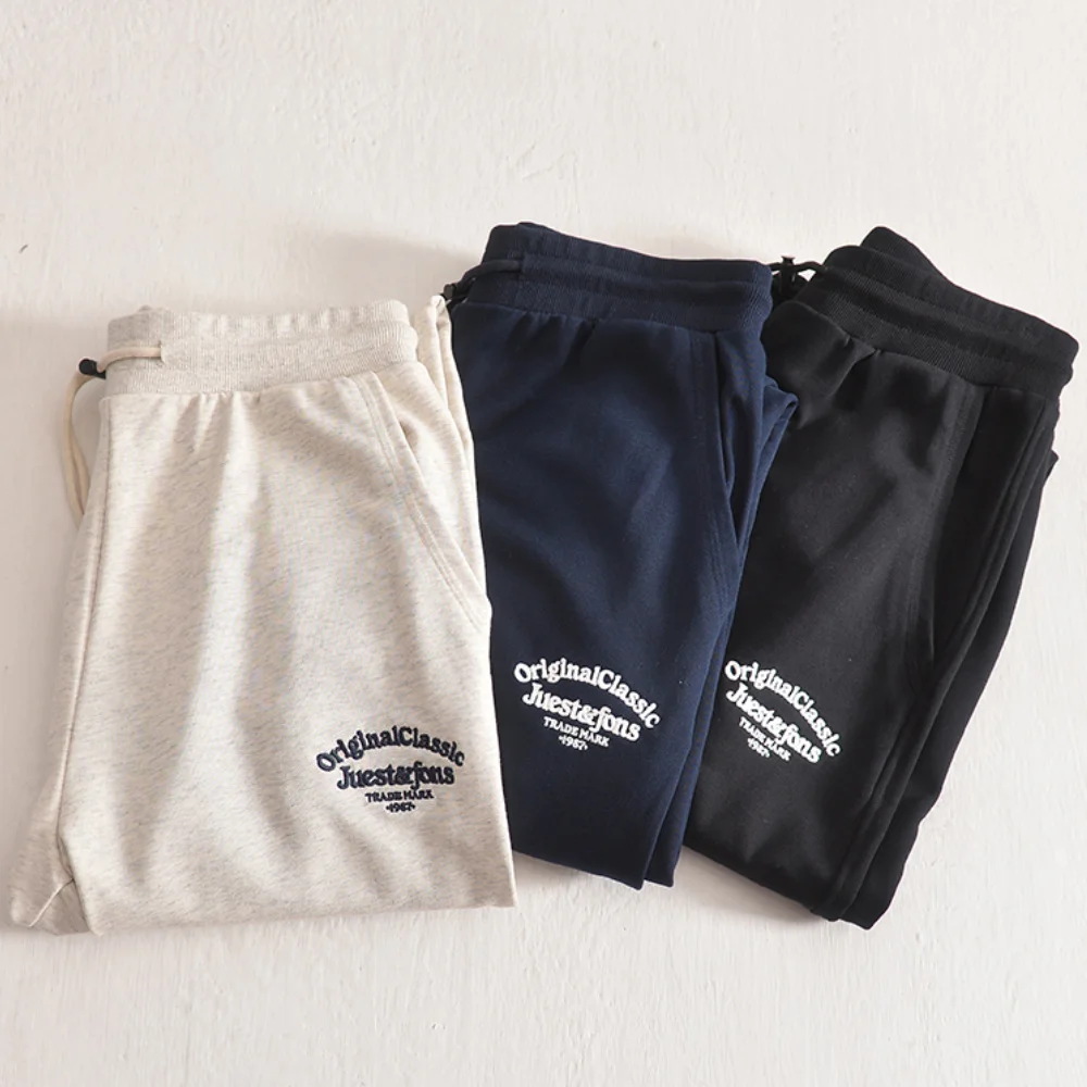 

Spring and Autumn Men's Sweater Pants Japanese retro solid color urtext embroidery printing loose sports foot knitted terry casu