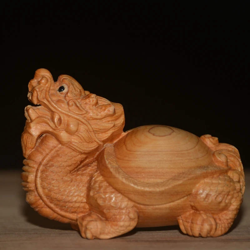 

Cliff bai boxwood carving living room tea table tea pet god beast dragon turtle Zhaocai car small decoration for men hand piece