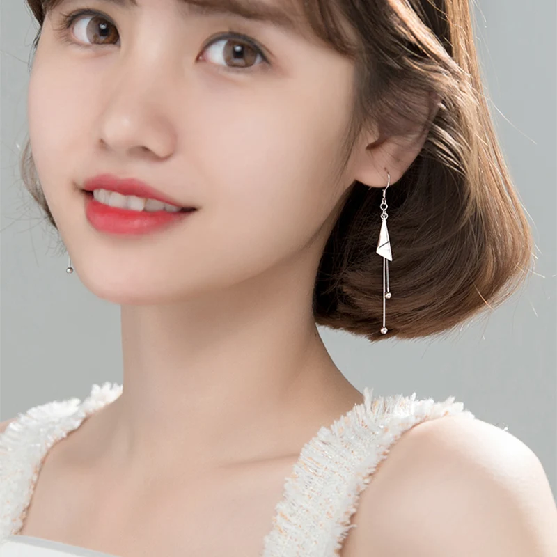 

Stylish triangular Diamond Earrings