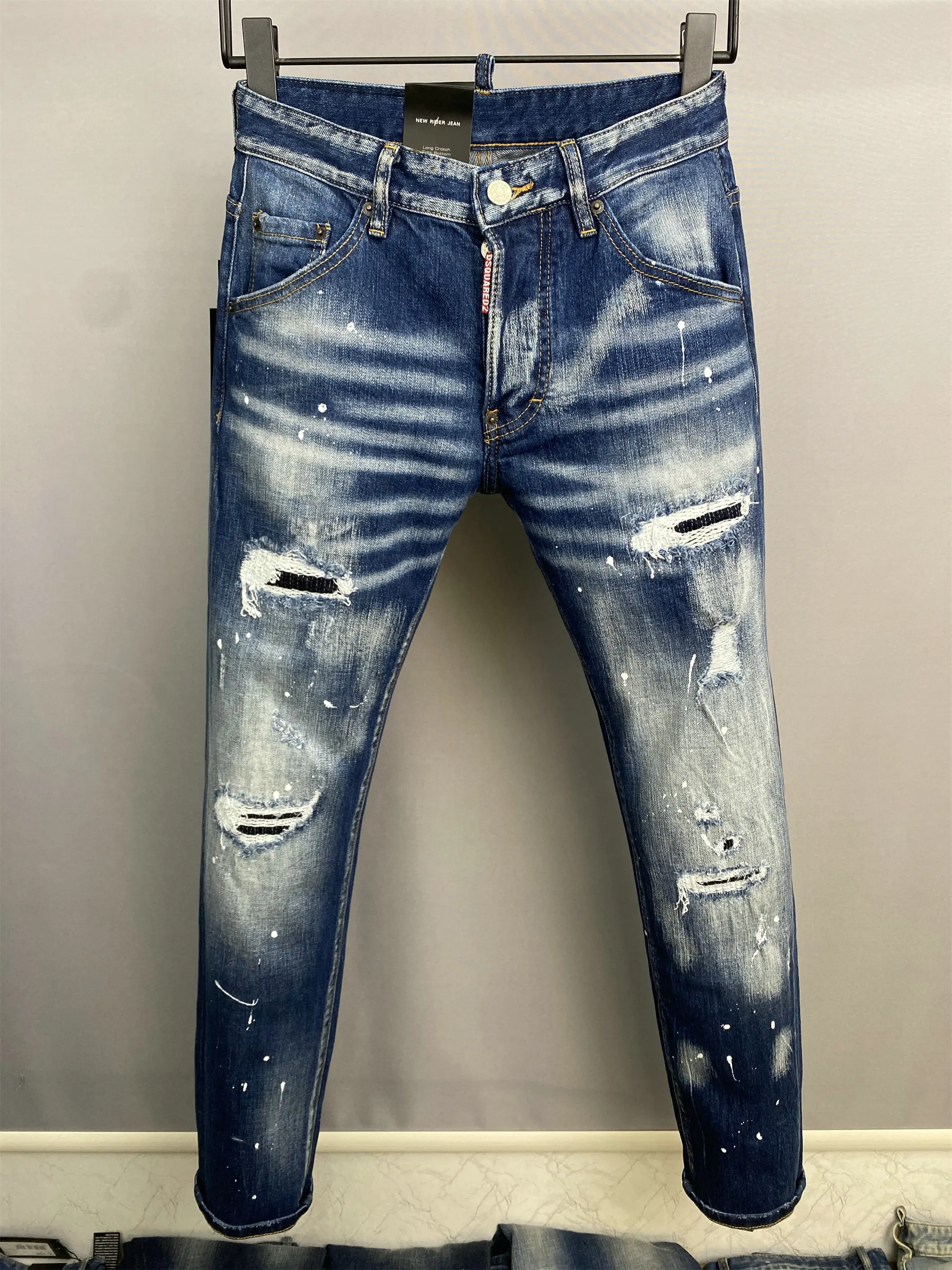 

Dsquared2 New 2023 Ripped Denim Blue Hole Paint Design zipper Hiphop Men's skinny jeans Men Clothing