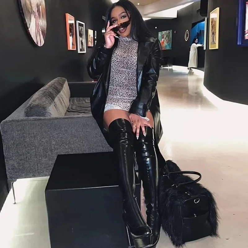 Женские сапоги выше колена на высоком каблуке 12 см с острым носком