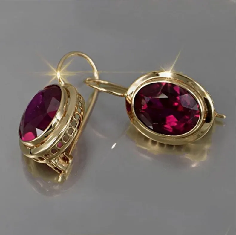 

Hot selling new fashion simple variety of red oval gemstone hollow long ear clip