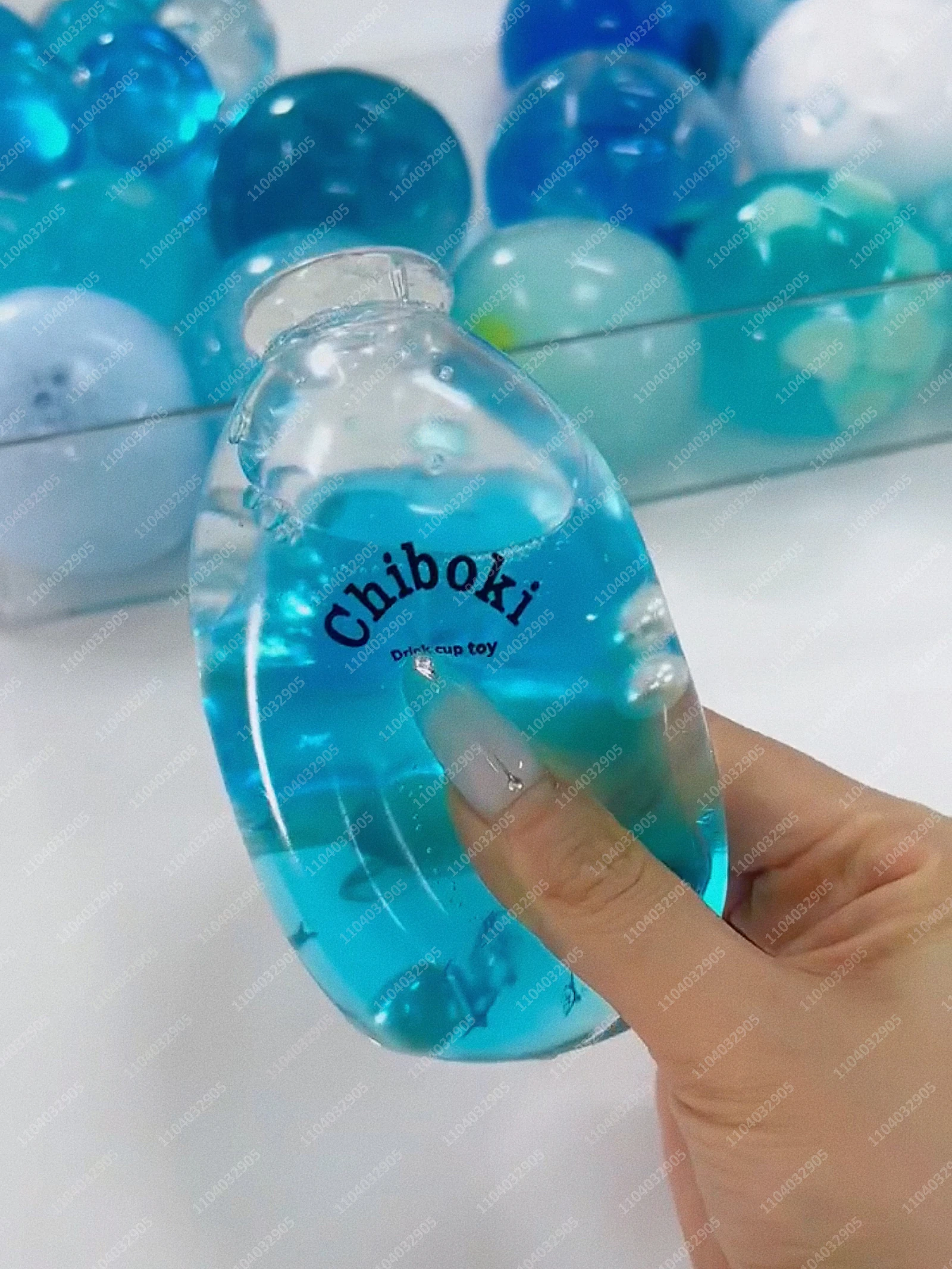 Фото Мяч-антистресс Ocean Blue Slushie в форме бутылки, тянущийся, хрустящий, сжимаемый, сенсорная игрушка ASMR для взрослых №5