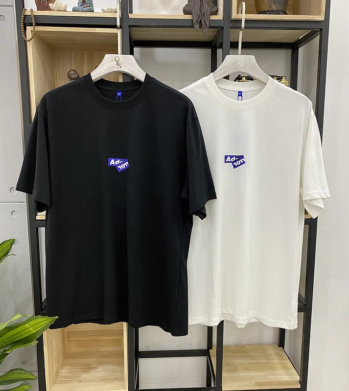 

2022 брендовая дизайнерская футболка 1:1 с принтом логотипа «ошибка адера» для женщин и мужчин, футболка с коротким рукавом, хип-хоп, уличная од...