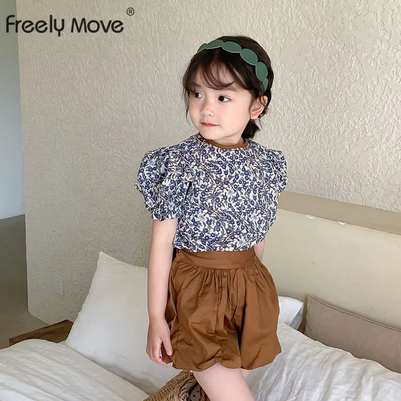 

Детское летнее хлопковое платье с рукавами-фонариками и цветочным принтом