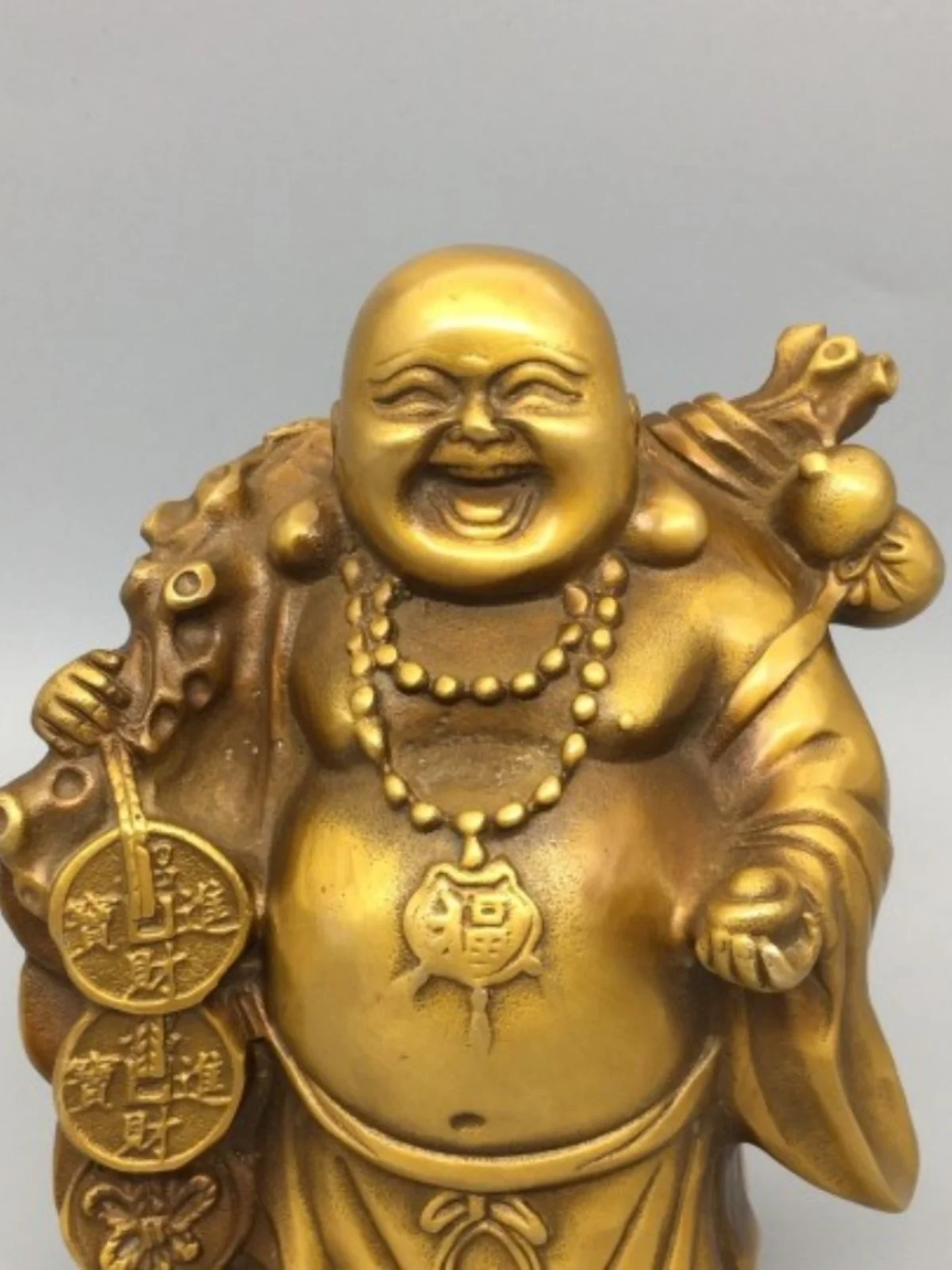 Латунные украшения Maitreya позволяют выбрать деньги отбивать золотые слитки и