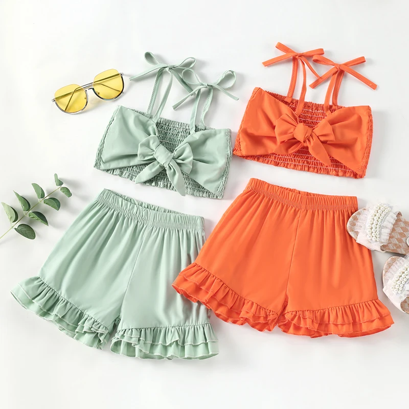 

2-7 Years Solid Little Girls Two-piece Outfits, Solid Color Spaghetti Strap Bowknot Pleated Crop Tops + Ruffled Short Pants