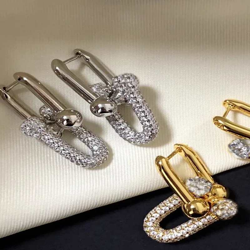 

Женские U-образные серьги из серебра 925 пробы с логотипом