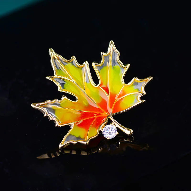 

Fashion Temperament Cute Enamel Painted Maple Leaf Brooch Thorn Horse Needle Micro-inlaid Zirconia Buckle Fixed Collar Needle