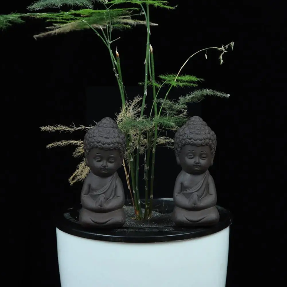Рисунок 4 - Креативные статуи Будды из чёрной керамики дзен
