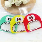 100 шт. 7 см милая маленькая острые зубы в виде монстра для выпечки, рождественские подарочные пакеты, пластиковые пакеты для конфет