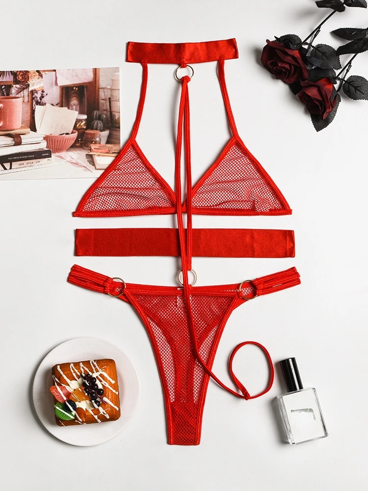 

Комплект женского прозрачного нижнего белья из бюстгальтера, трусиков и сетчатой ткани