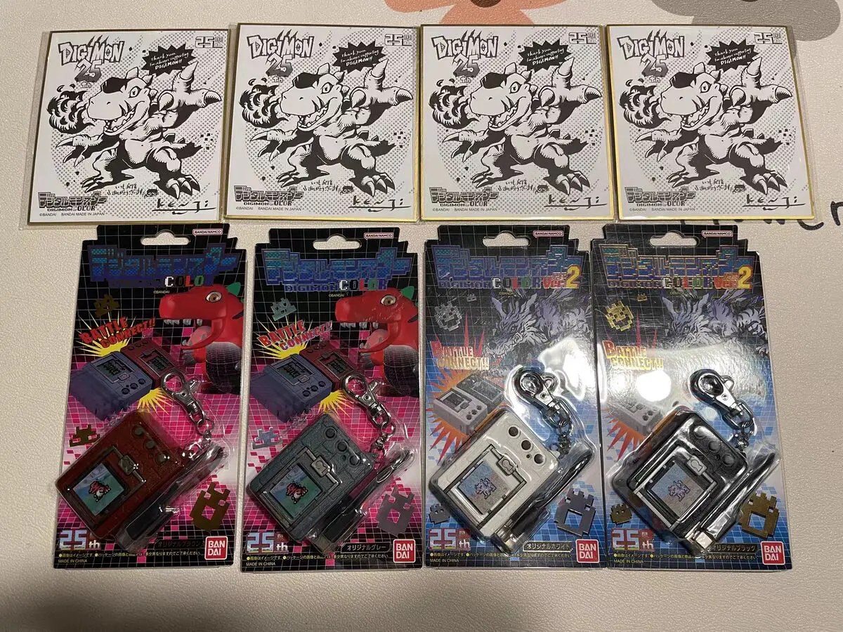 

Bandai Tamagotchi Limit Digital Monster Yuanzu Tyrannosaurus Machine 25th Anniversary Reprint Color Plate Game Console In Stock