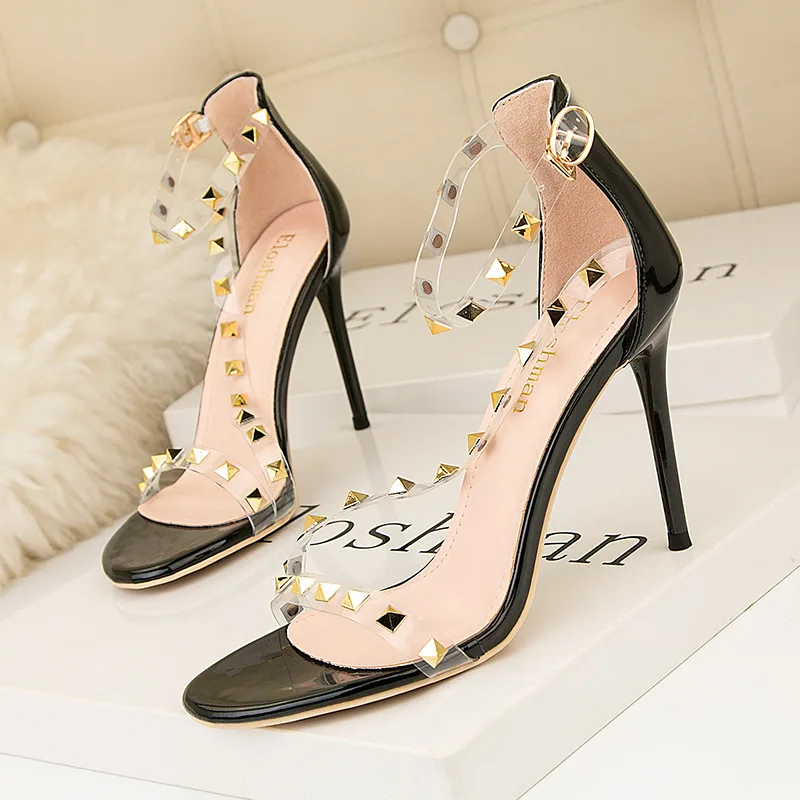 

High Heeled Shoes Rivets Shallow Mouth Pointed Sexy Nightclub Women's Pumps Hollowed Out One Line Belt Transparent Sandals