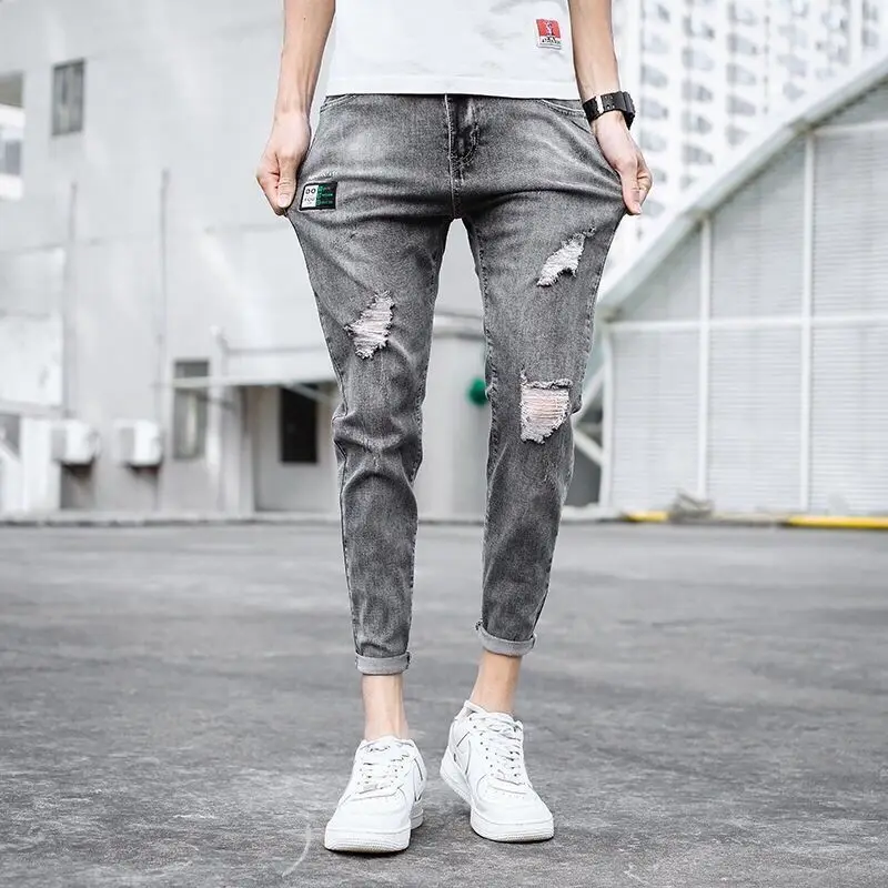 Spring and summer thin jeans men's Korean version of the trend of elastic slim fit pants men's casual ripped nine-point pants