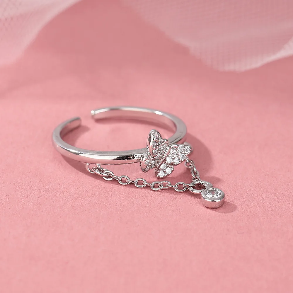 Женское регулируемое кольцо с бабочкой и кисточкой