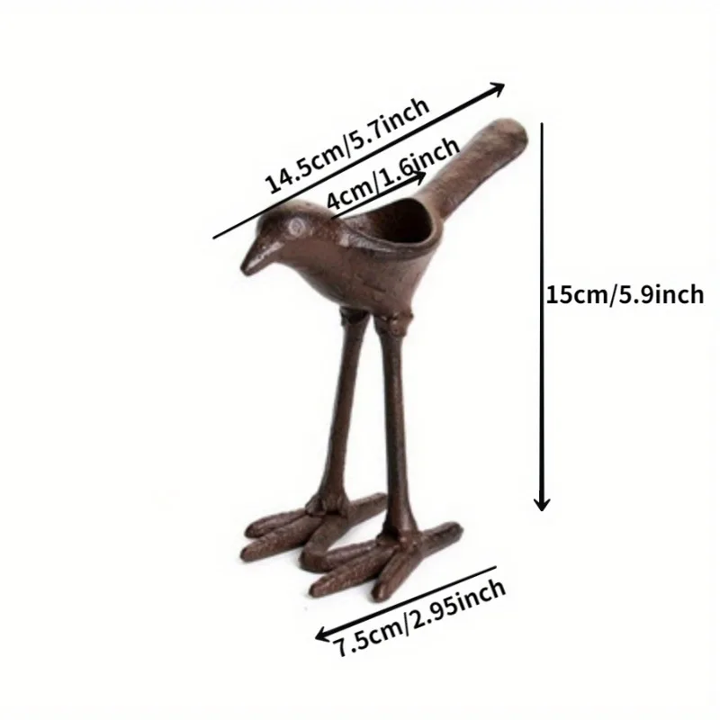 

Чугунный подсвечник-птица