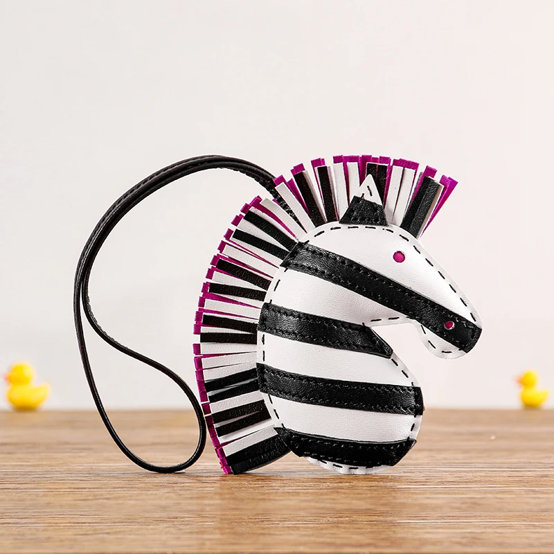 DIMY 2023 NEW Handbag pendant pony pendant big brand high-grade bag ornaments niche tassel zebra head cute jewelry accessories