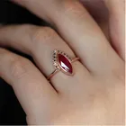 Кольцо женское из розового золота с натуральным ромбом и камнем