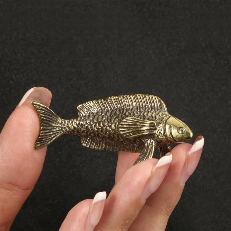 

Миниатюрная статуэтка из латуни Arowana