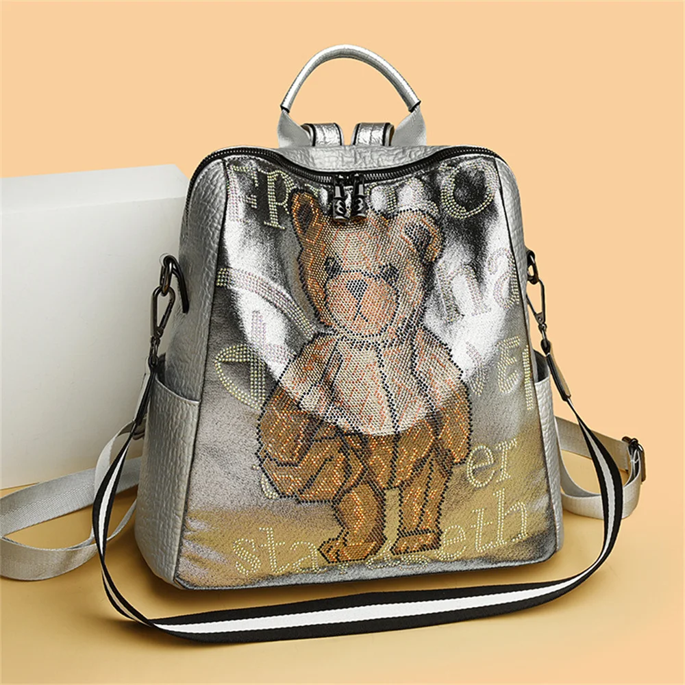 

European and American leather bag women's bag bear hot drill backpack burst crack patent leather backpack small crowd bag