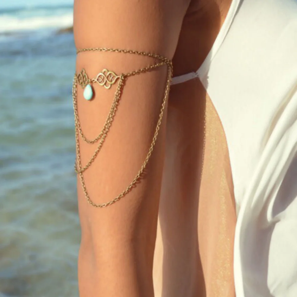 

Hollow out auspicious pendant water drop loose stone tassel arm chain bracelet women's gift European and American Jewelry