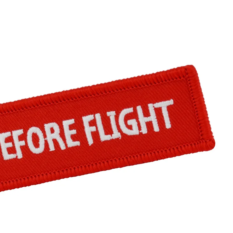 

50Pcs Kiss Me Before Flight Keychains Car Motorcycle Embroidered Keyring Advertising Gifts Embroidered Keychains Car Pendants