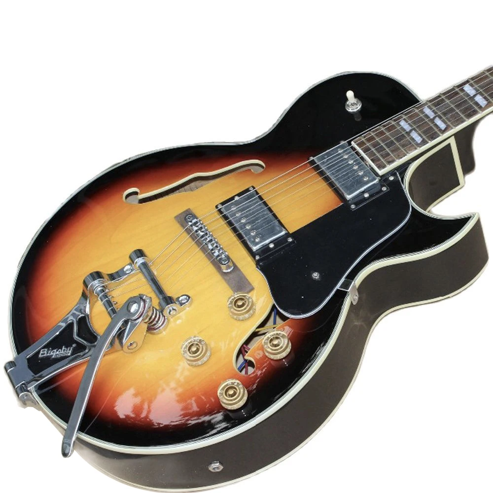

Custom F hollow body Jazz electric guitar,Sunburst color Jazz gitaar.Rosewood fingerboard.Chrome hardware gitaar,vibrato system