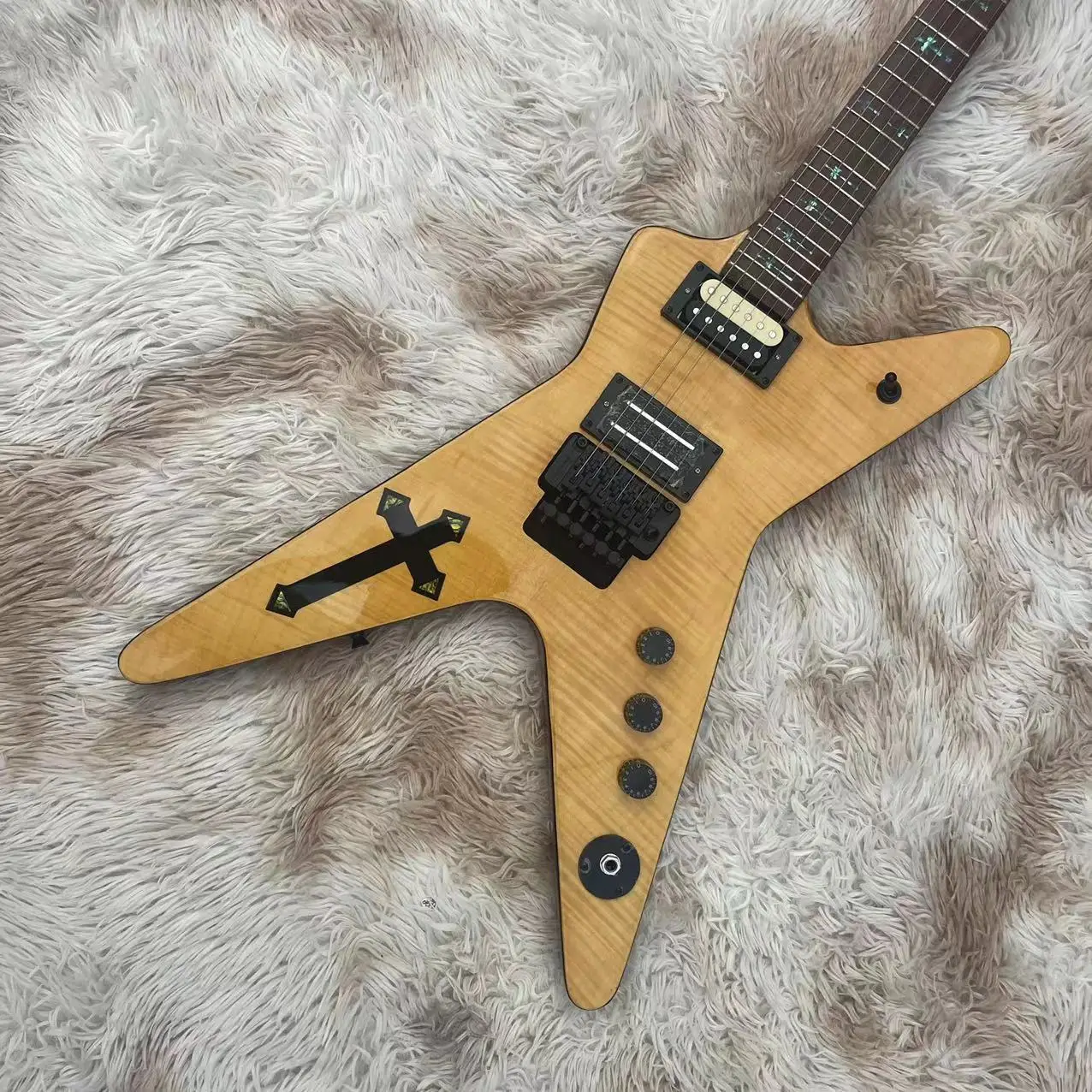 

Irregular large fork integrated electric guitar, with wooden body cross inlay, rose wood fingerboard, tremolo drawstring board,