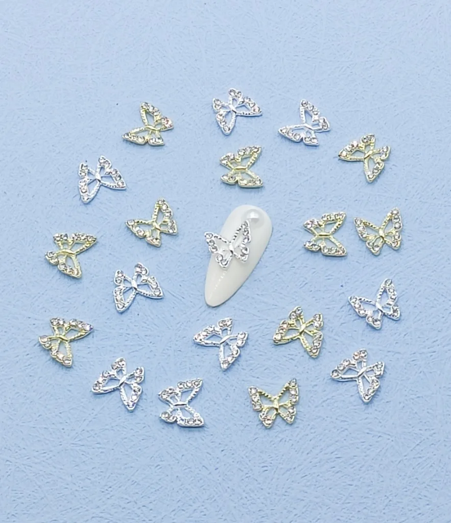 

Popular New Product Hollow Alloy Small Butterfly Nail Ornament Decoration Accessories Luxury Delicate BlingBling Nail Art Charm