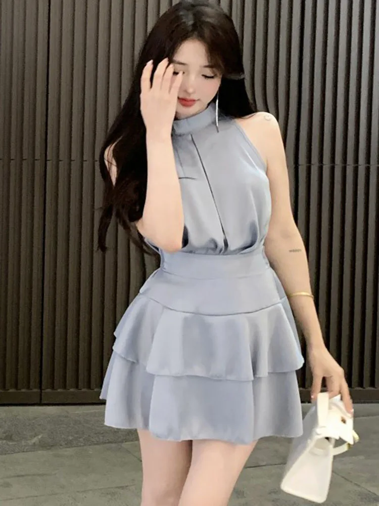 

Комплект из двух предметов для женщин, лето 2023, Модная элегантная женская сексуальная рубашка с лямкой на шее + юбка-трапеция мини с оборками, Женский Повседневный костюм