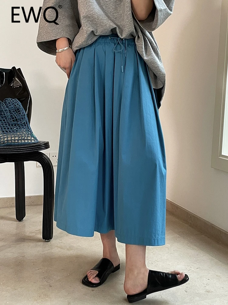 

Женская плиссированная юбка средней длины, с завышенной талией