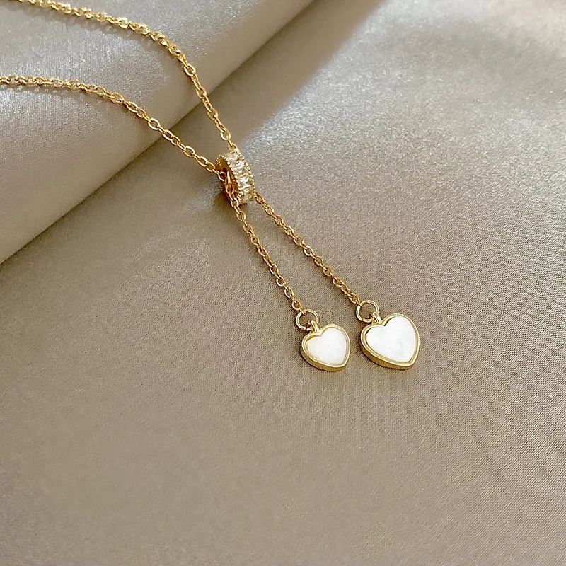 

Korean version of the simple fashion love shell diamond titanium steel necklace female temperament exquisite clavicle chain