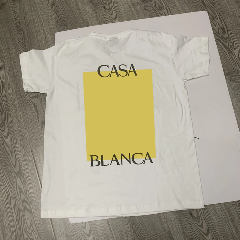 

Stock CASABLANCA T-shirts High Quality Yellow Square Letter Print Short Sleeve Real Photos Cotton T Shirt for Men Women