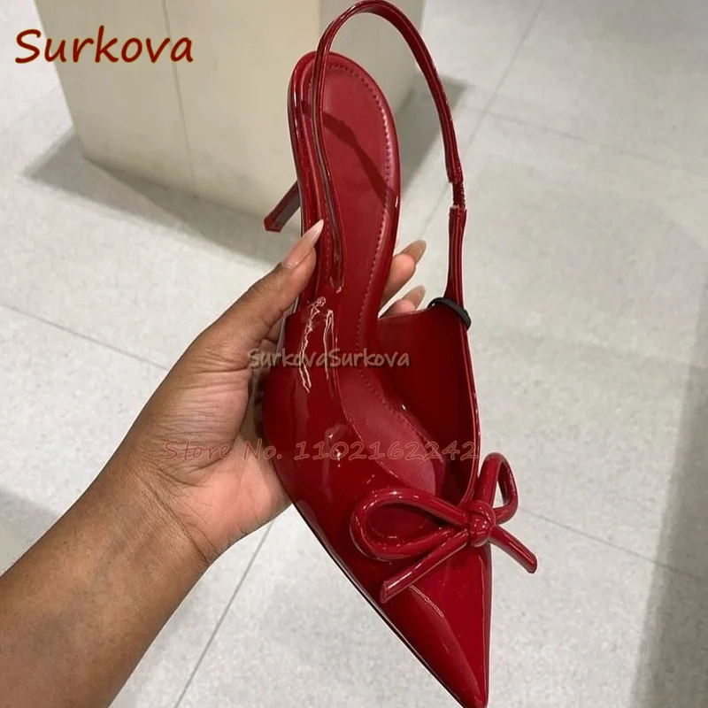 Бордовые туфли-лодочки из лакированной кожи с бантом на высоком каблуке острым