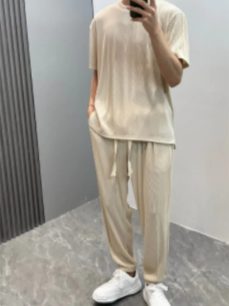 

Men's Fashion Solid 2 Piece Suit Casual Short Sleeve O Neck Pullover Tops And Drawstring Trousers Men Set New Simple Loose Suits