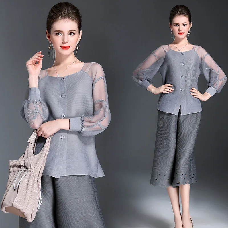 

Splicing mesh hot drill long-sleeved top coat spring and summer Miyake round neck loose casual pleated cardigan coat