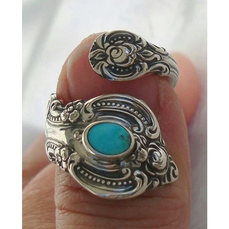

Creative flower plated Thai silver ring European and American retro Turquoise exaggerated ring