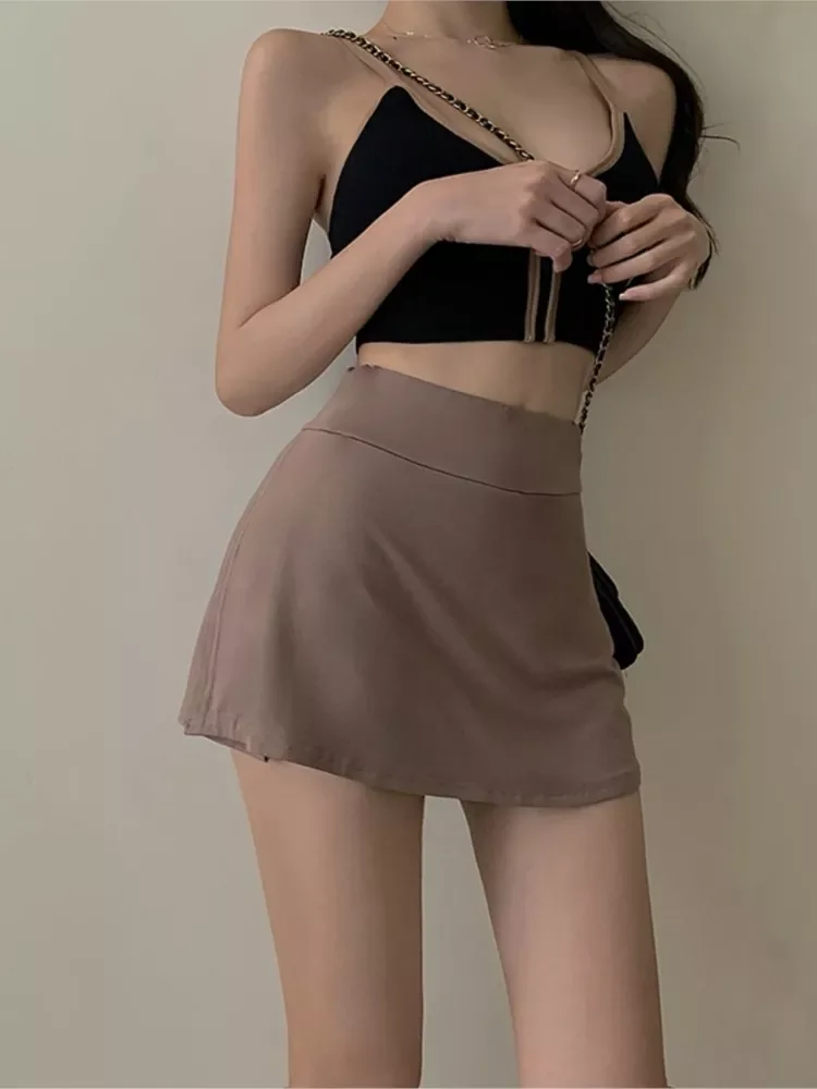 

Мини-юбка цвета хаки, трапециевидная, с завышенной талией, составного кроя