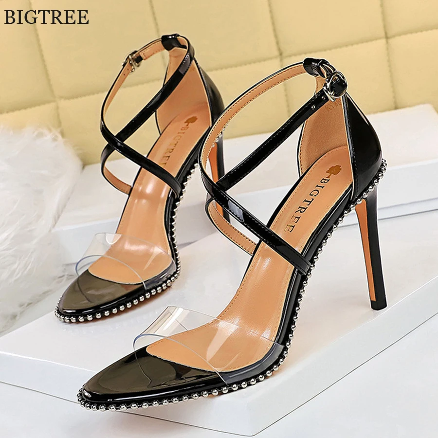 

Sexy PVC Transparent Rivet Sandals Women New Summer High Heels Cross-Strap Shoes Patent Leather Open Toe Party Dress Pumps Woman